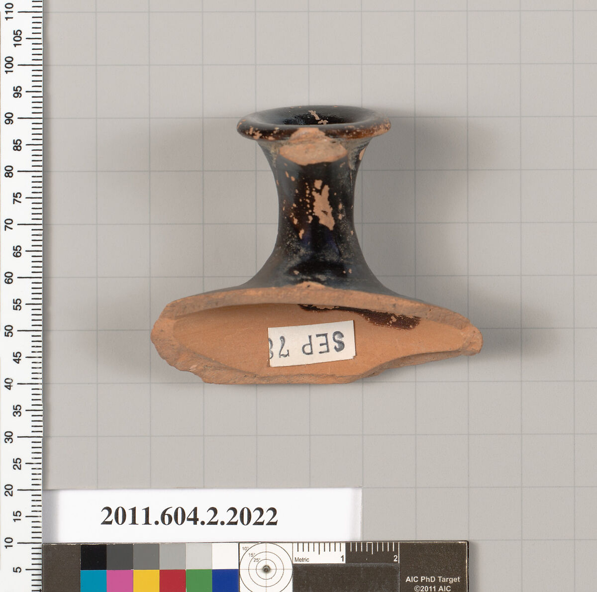 Terracotta fragment of an askos (flask with a spout and handle over the top), Terracotta, Greek, Attic