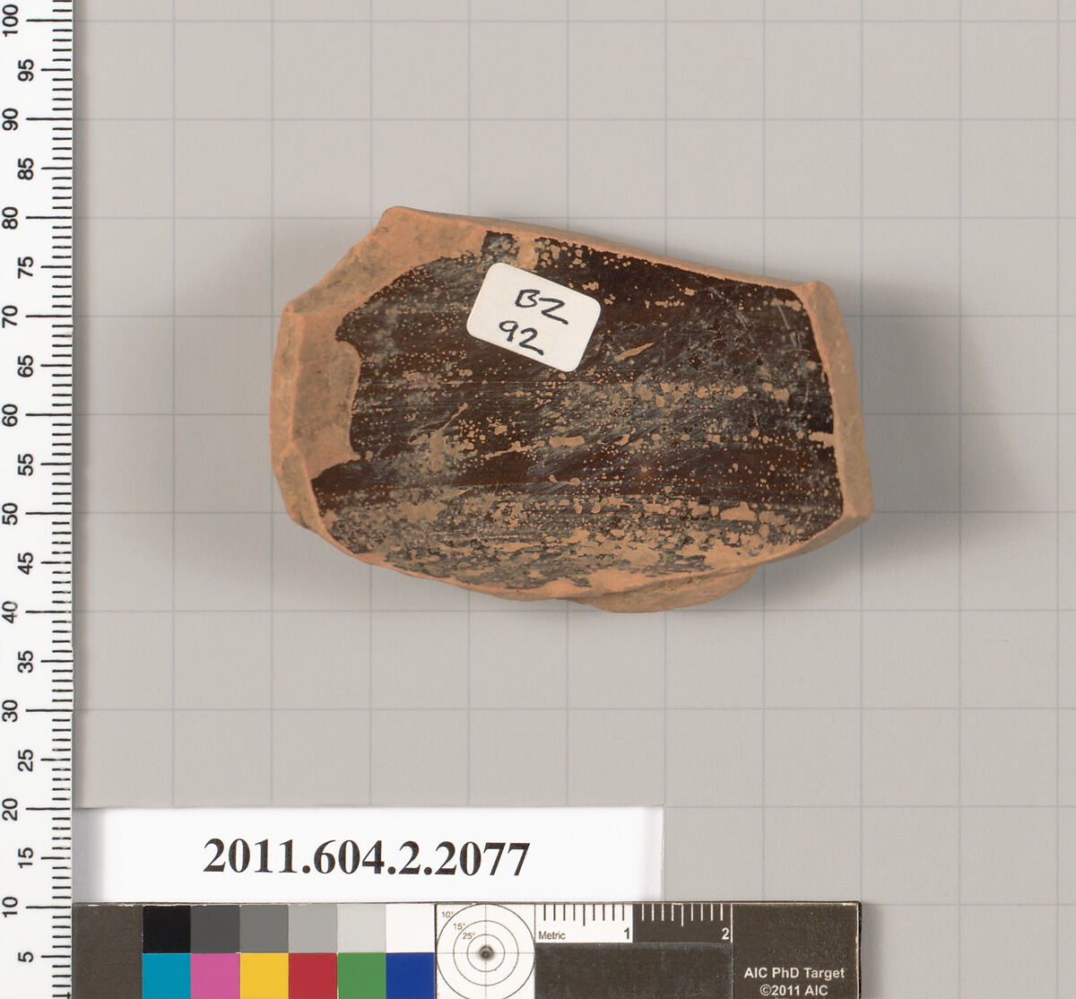 Terracotta fragment of an oinochoe: chous (jug), Terracotta, Greek, Attic