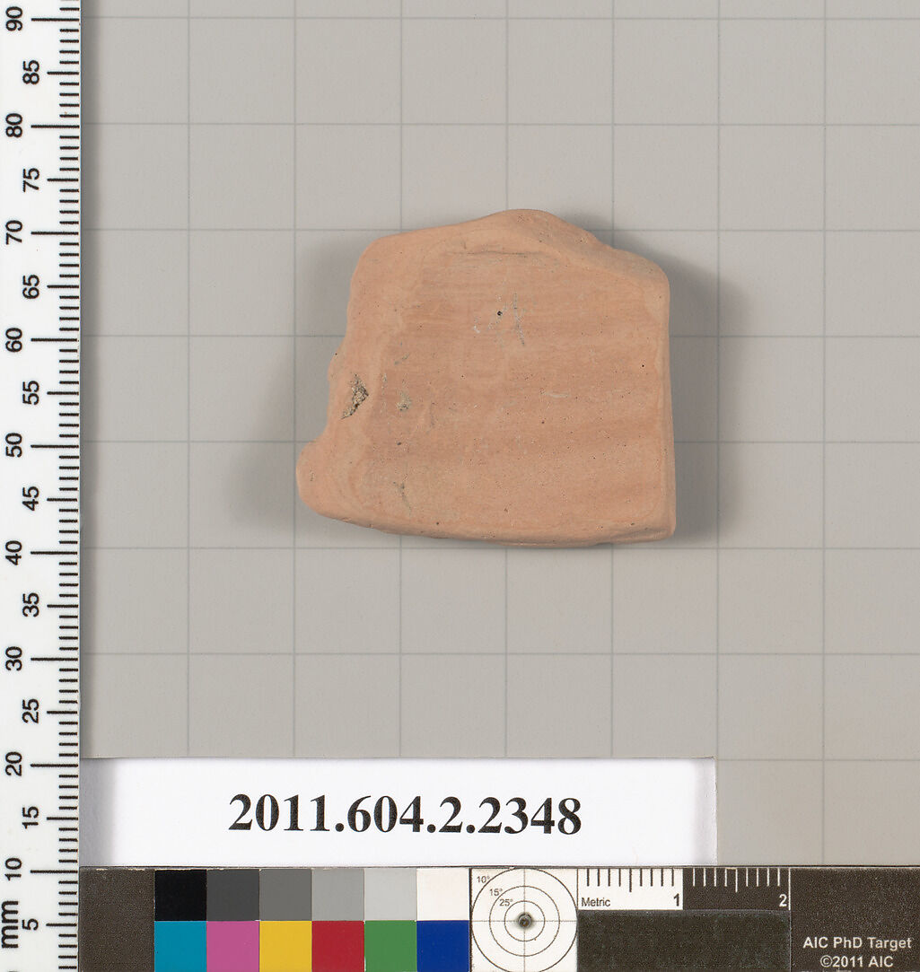 Terracotta fragment of a squat lekythos (oil flask), Terracotta, Greek, Attic