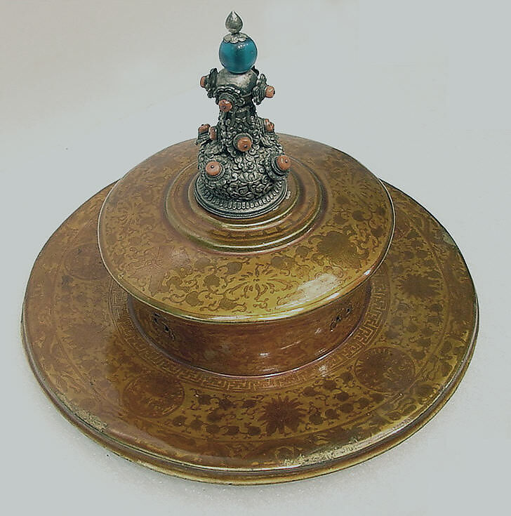 Monk's Hat, Lacquer with finial of silver, coral and blue glass, Tibet 