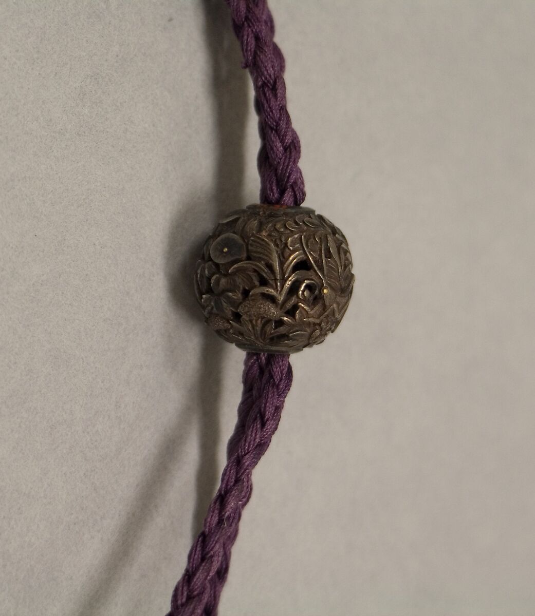 Ojime, Pierced metal with floral design, Japan