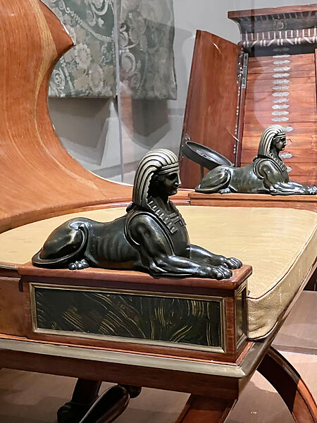 Sphinx Chair, Mahogany, with painted simulated marble panels, lacquered brass mouldings, mounted with bronze sphinxes and paw feet, French
