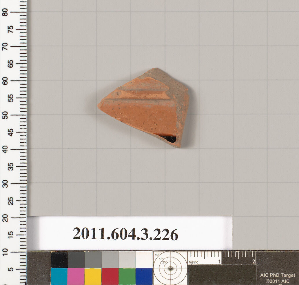 Terracotta fragment of a neck-amphora of Nicosthenic shape (jar), Terracotta, Greek, Attic 