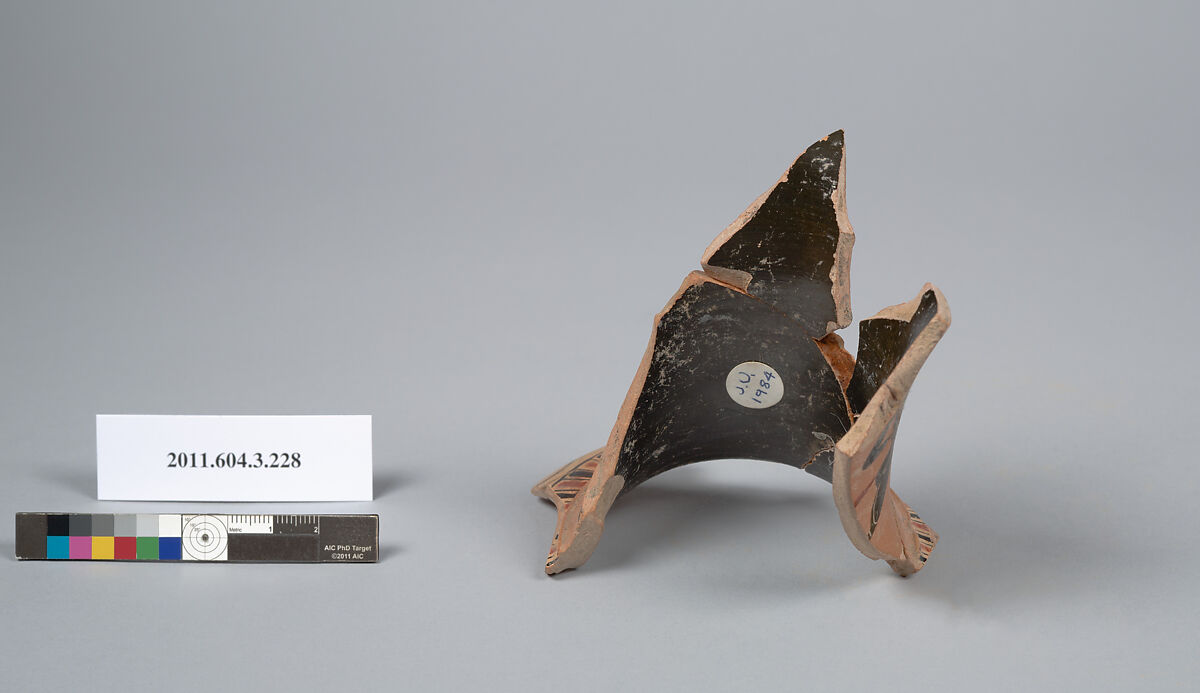 Terracotta fragment of a neck-amphora of Nicosthenic shape (jar), Terracotta, Greek, Attic
