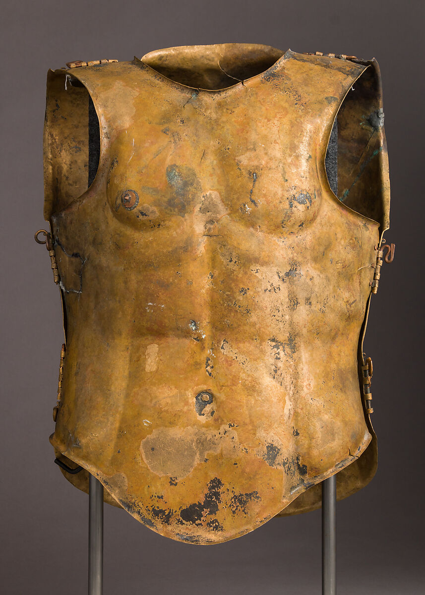 Helmet of the Italo-Chalcidian Type, Anatomical Cuirass, and Left Greave, Bronze, silver, Etruscan, probably Vulci
