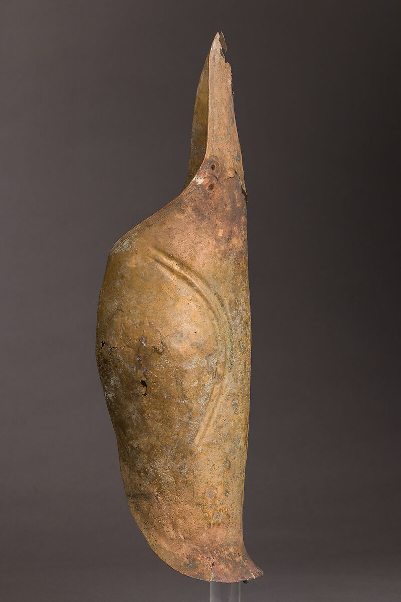 Helmet of the Italo-Chalcidian Type, Anatomical Cuirass, and Left Greave, Bronze, silver, Etruscan, probably Vulci