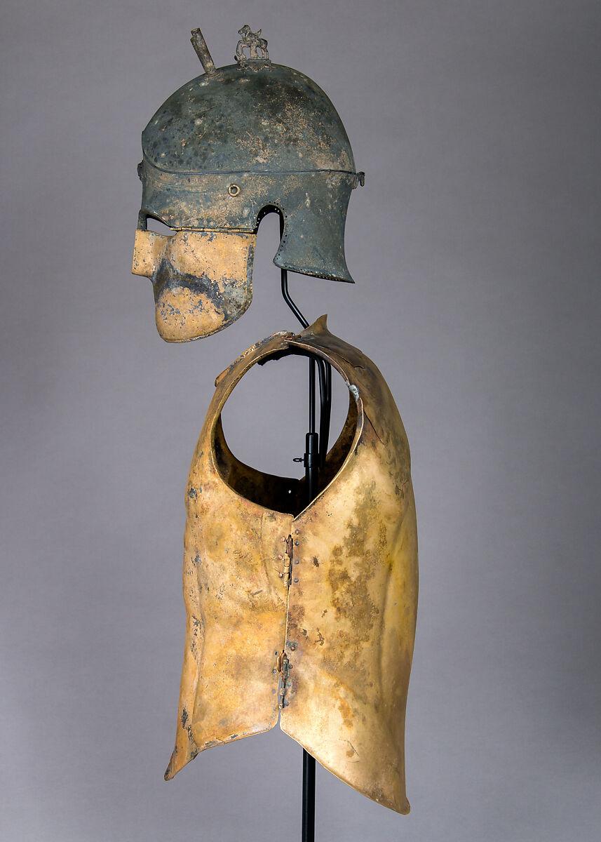 Helmet of the Italo-Chalcidian Type, Anatomical Cuirass, and Left Greave, Bronze, silver, Etruscan, probably Vulci