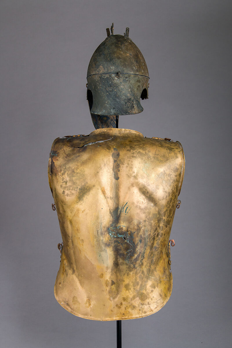 Helmet of the Italo-Chalcidian Type, Anatomical Cuirass, and Left Greave, Bronze, silver, Etruscan, probably Vulci