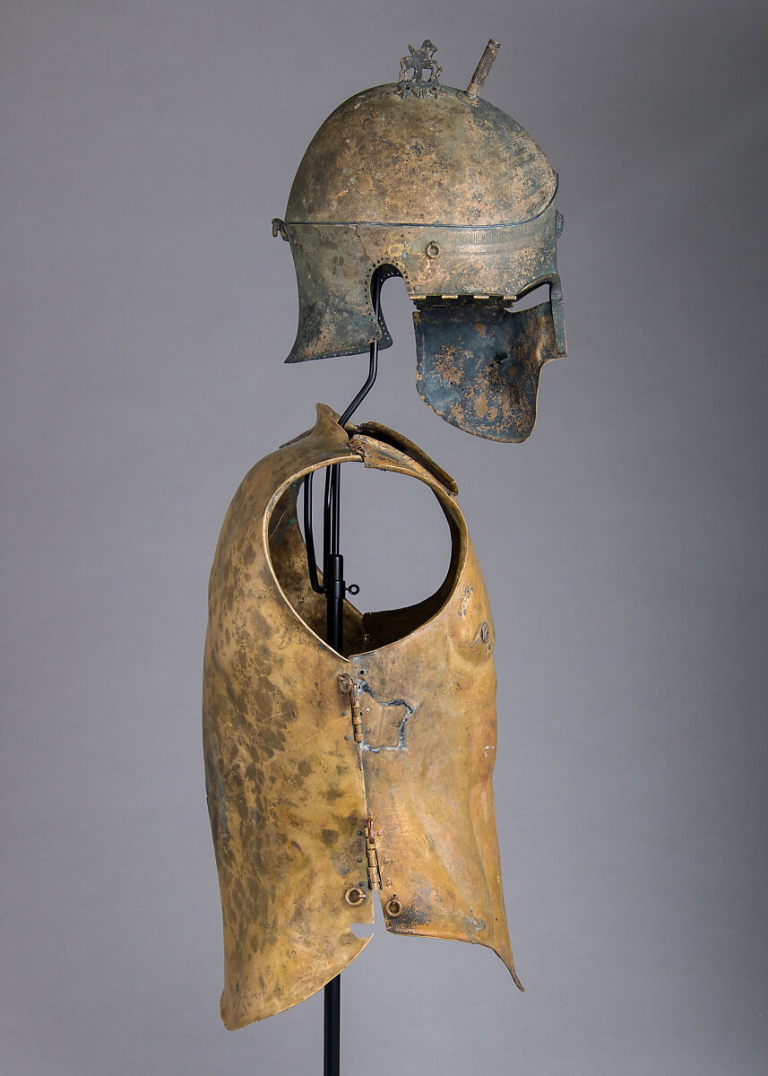 Helmet of the Italo-Chalcidian Type, Anatomical Cuirass, and Left Greave, Bronze, silver, Etruscan, probably Vulci