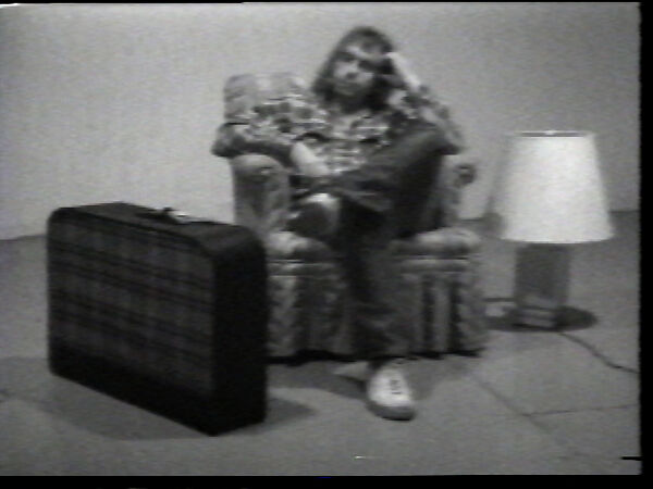 Chair/Lamp/Suitcase, William Wegman (American, born 1943), Single-channel digital video, transferred from Sony CV 1/2-inch video tape, black-and-white, sound, 58 sec. 