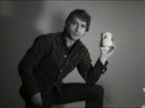 Tammy and Can of Plums, William Wegman (American, born 1943), Single-channel digital video, transferred from Panasonic 1/2-inch video tape, black-and-white, sound, 21 sec. 