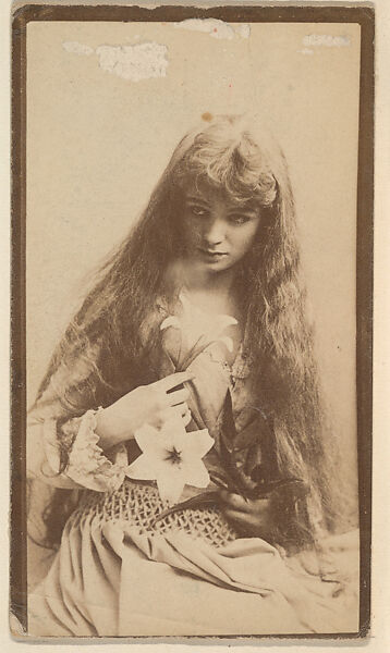 Issued by W. Duke, Sons & Co. | [Actress with long hair holding lilies ...