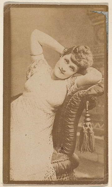 [Actress reclining on sofa with tassel], from the Actors and Actresses series (N150b) issued by Duke Sons & Co. to promote Duke Cigarettes, Issued by W. Duke, Sons &amp; Co. (New York and Durham, N.C.), Albumen photograph 