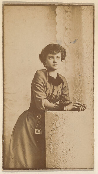 [Actress with dark hair leaning on architectural element], from the Actors and Actresses series (N150b) issued by Duke Sons & Co. to promote Duke Cigarettes, Issued by W. Duke, Sons &amp; Co. (New York and Durham, N.C.), Albumen photograph 