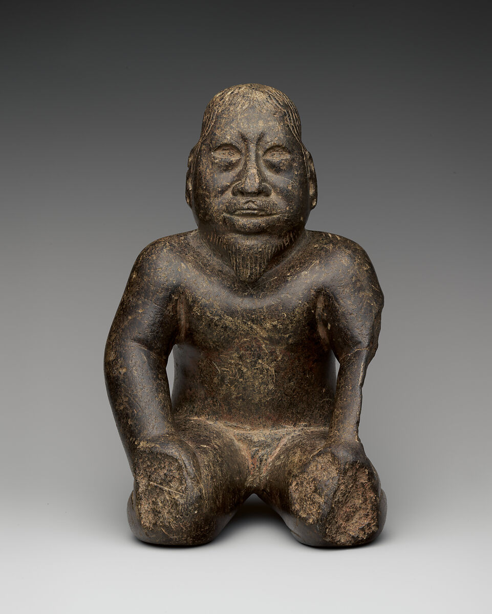 Kneeling Bearded Figure, Serpentine, pigment (probably cinnabar), Olmec