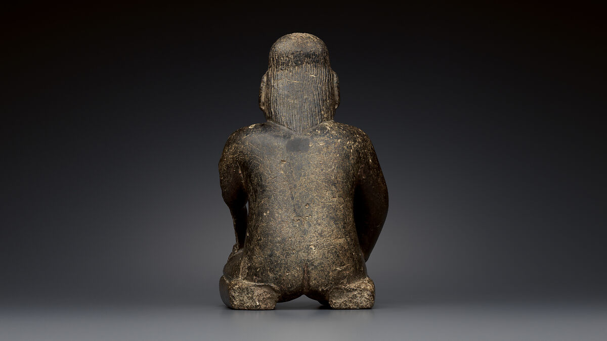 Kneeling bearded figure, Olmec artist(s), Serpentine, pigment, Olmec