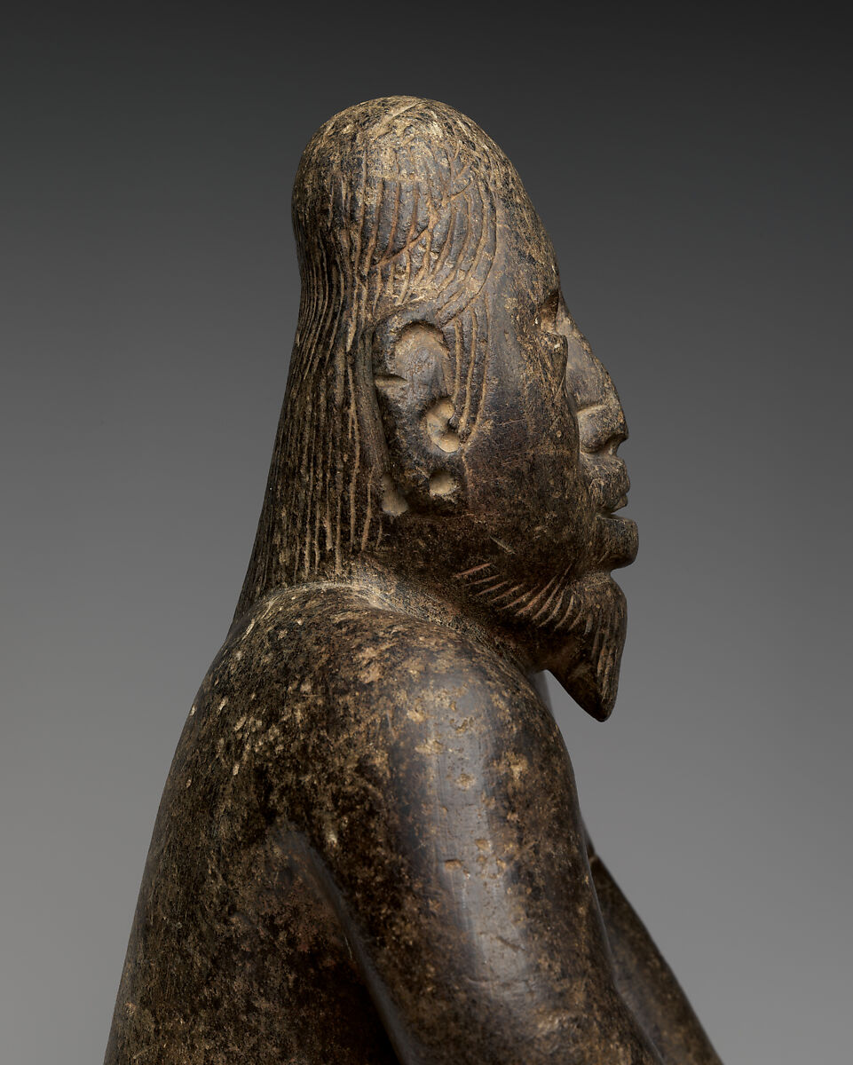 Kneeling bearded figure, Olmec artist(s), Serpentine, pigment, Olmec