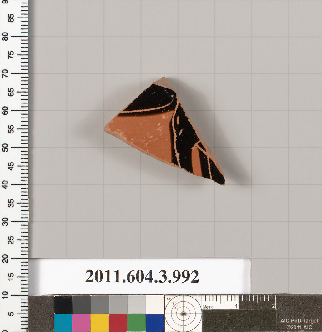 Terracotta fragment of a lekanis lid (covered dish), Terracotta, Greek, Attic 