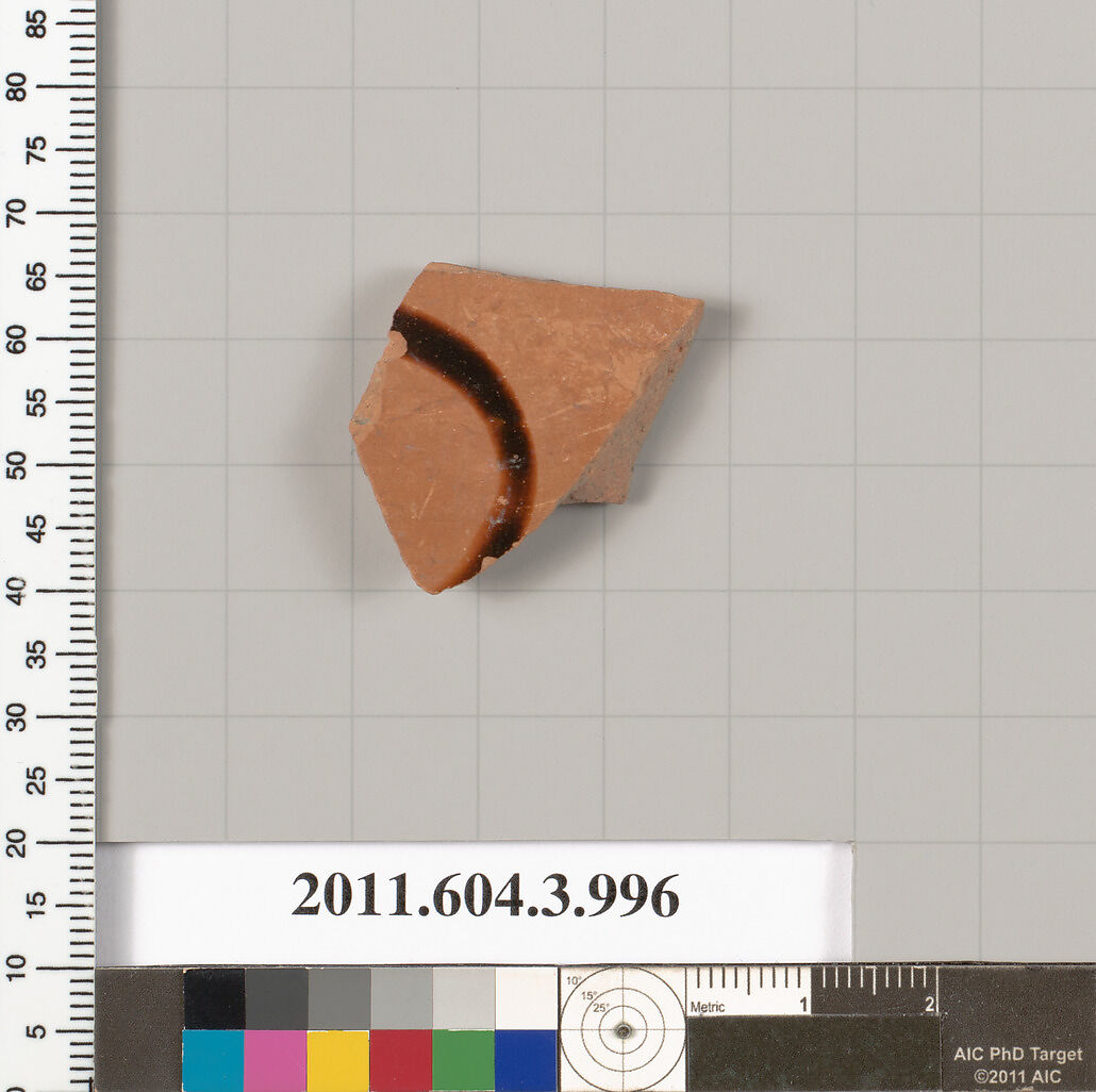 Terracotta fragment of a lekanis lid (covered dish), Terracotta, Greek, Attic 