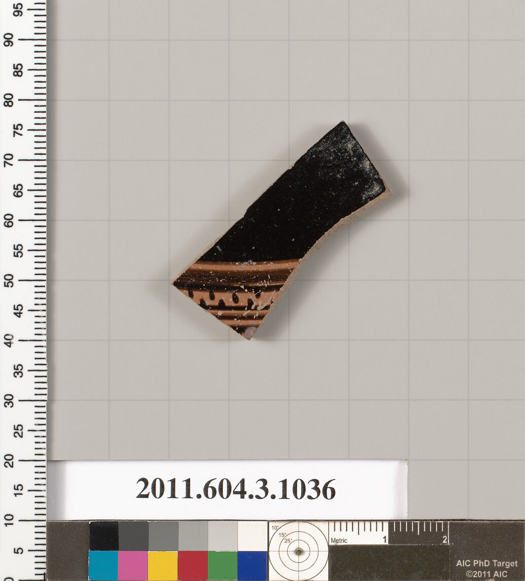 Terracotta fragment of a fish plate, Terracotta, Greek, Attic 