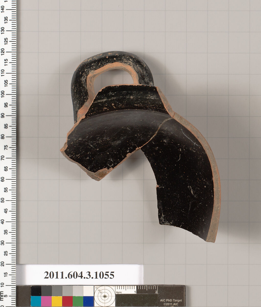 Terracotta fragment of a mastoid (drinking cup with narrow base), Terracotta, Greek, Attic