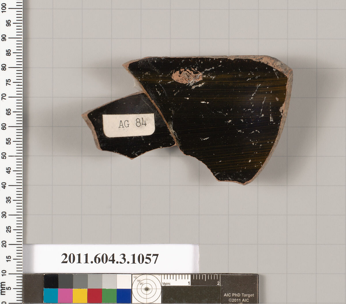 Terracotta fragment of a mastoid (drinking cup with narrow base), Terracotta, Greek, Attic