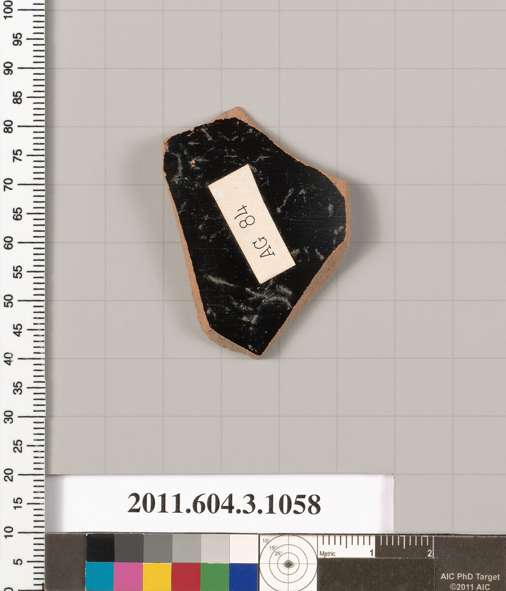 Terracotta fragment of a mastoid (drinking cup with narrow base), Terracotta, Greek, Attic
