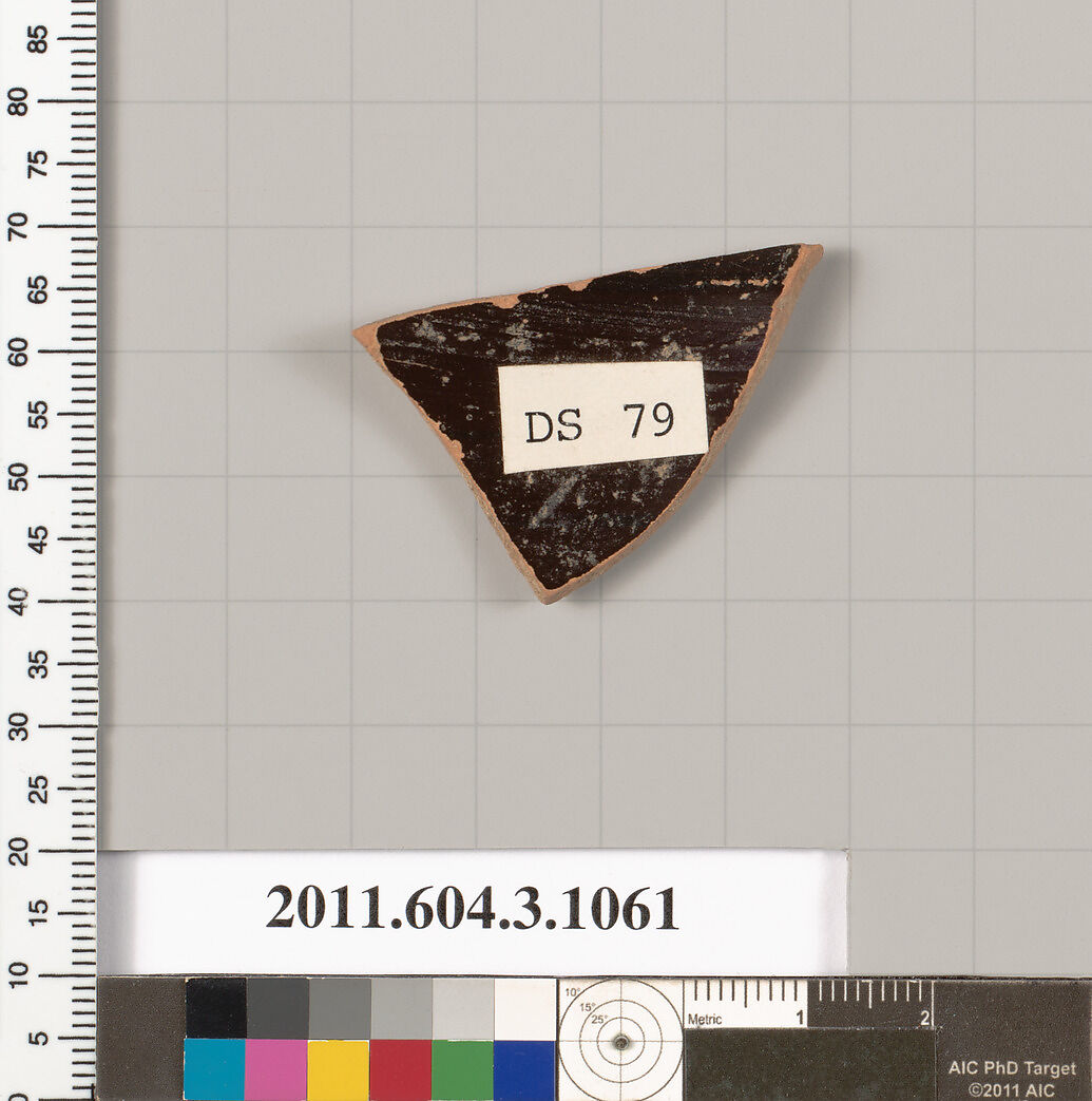 Terracotta fragment of a mastoid (drinking cup with narrow base), Terracotta, Greek, Attic