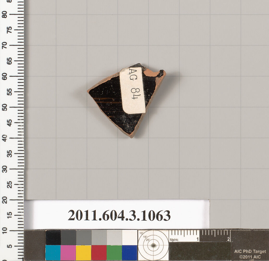 Terracotta fragment of a mastoid (drinking cup with narrow base), Terracotta, Greek, Attic