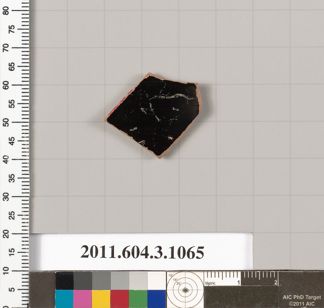 Terracotta fragment of a mastoid (drinking cup with narrow base), Terracotta, Greek, Attic