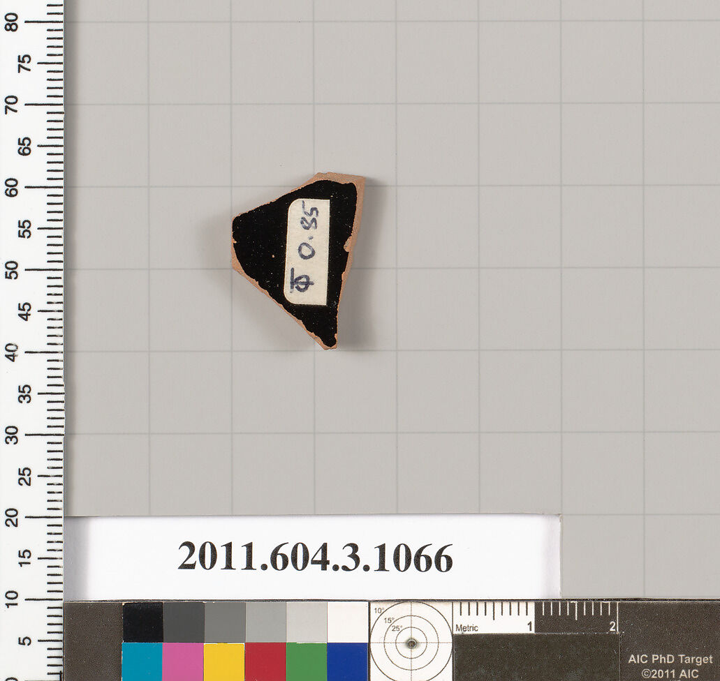 Terracotta fragment of a mastoid (drinking cup with narrow base), Terracotta, Greek, Attic