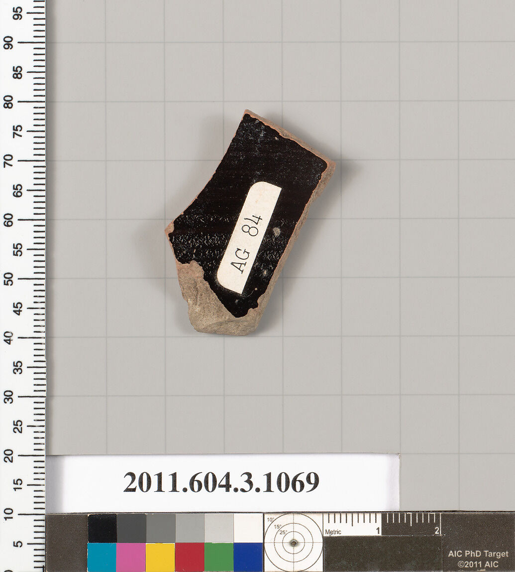 Terracotta fragment of a mastoid (drinking cup with narrow base), Terracotta, Greek, Attic