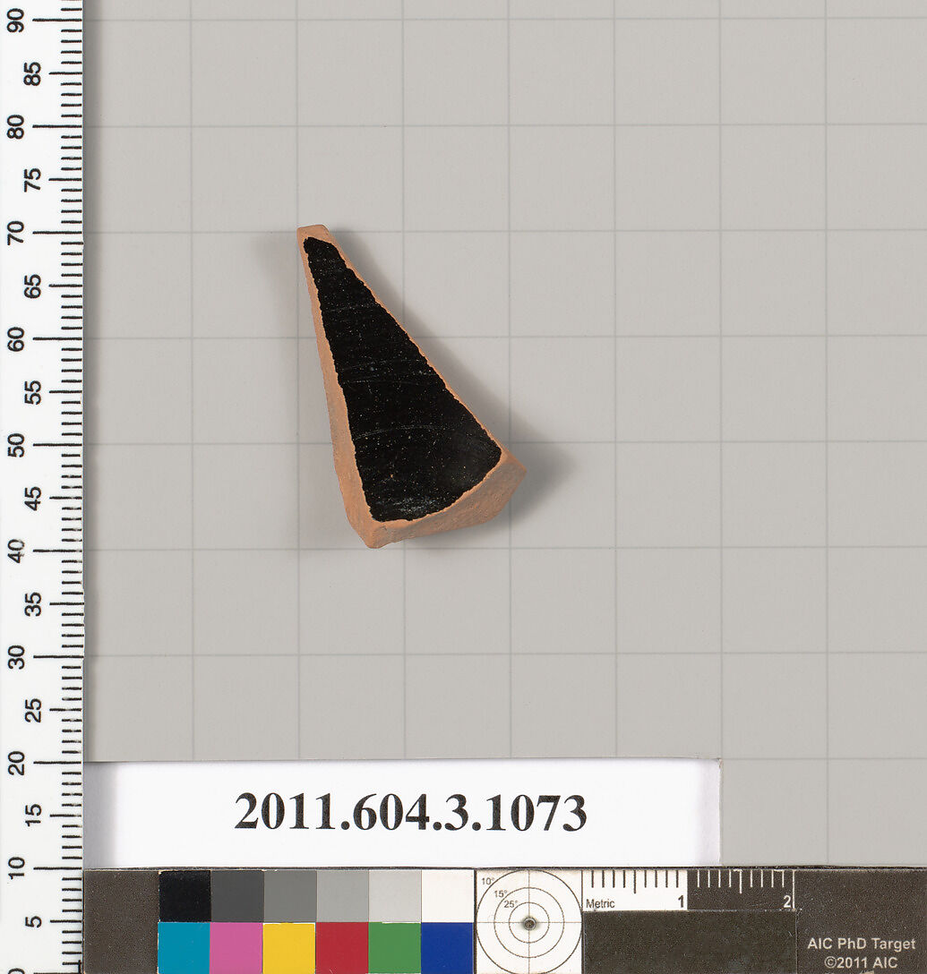 Terracotta fragment of a mastoid (drinking cup with narrow base), Terracotta, Greek, Attic