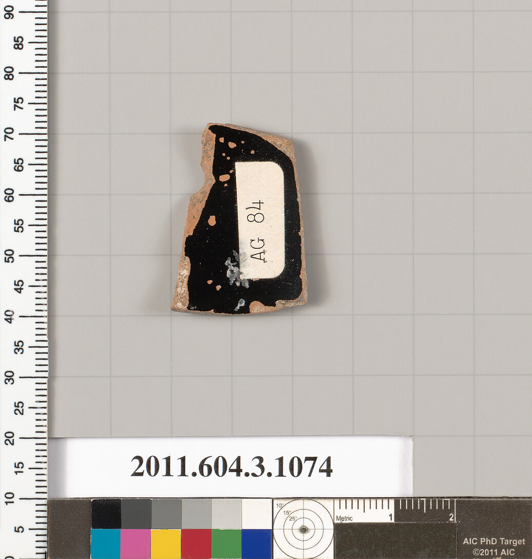 Terracotta fragment of a mastoid (drinking cup with narrow base), Terracotta, Greek, Attic