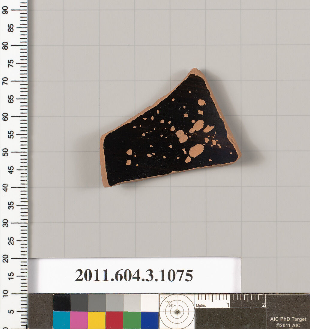 Terracotta fragment of a mastoid (drinking cup with narrow base), Terracotta, Greek, Attic