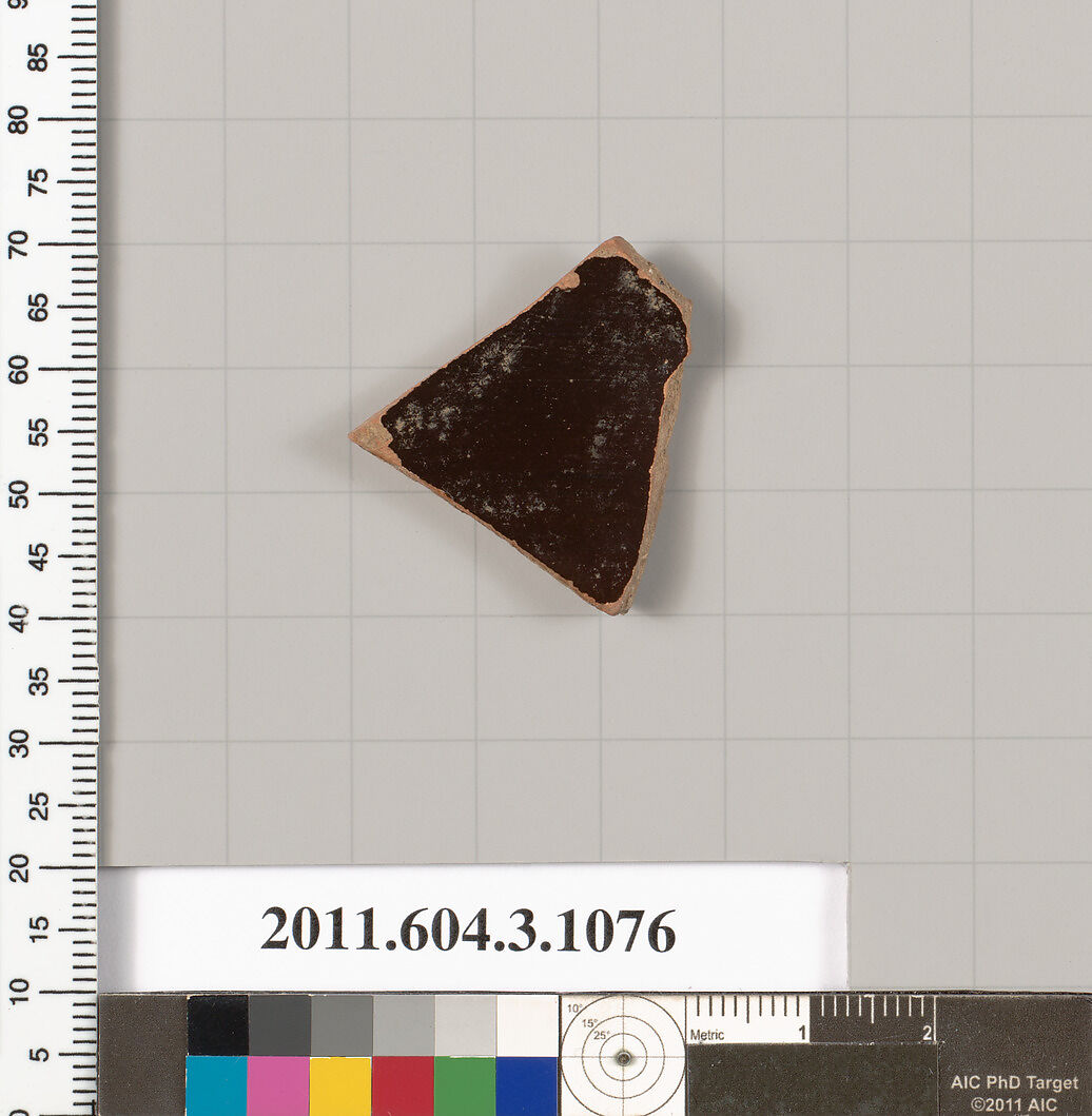 Terracotta fragment of a mastoid (drinking cup with narrow base), Terracotta, Greek, Attic
