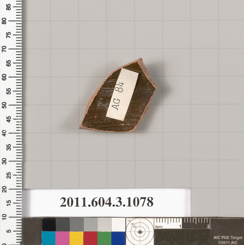 Terracotta fragment of a mastoid (drinking cup with narrow base), Terracotta, Greek, Attic