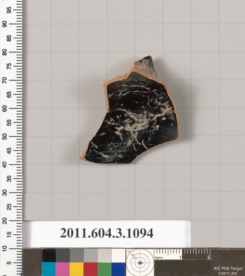 Terracotta fragment of a mastoid (drinking cup with narrow base), Terracotta, Greek, Attic