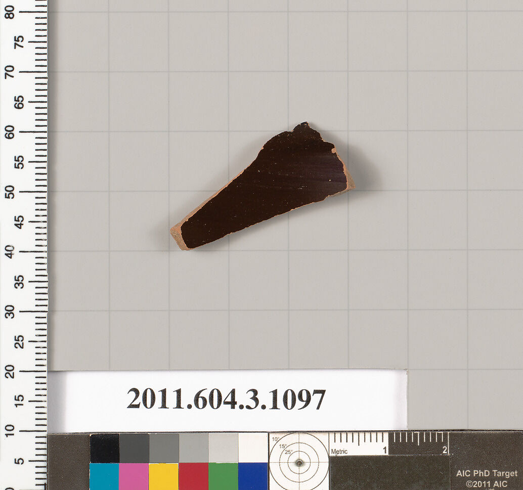 Terracotta fragment of a mastoid (drinking cup with narrow base), Terracotta, Greek, Attic
