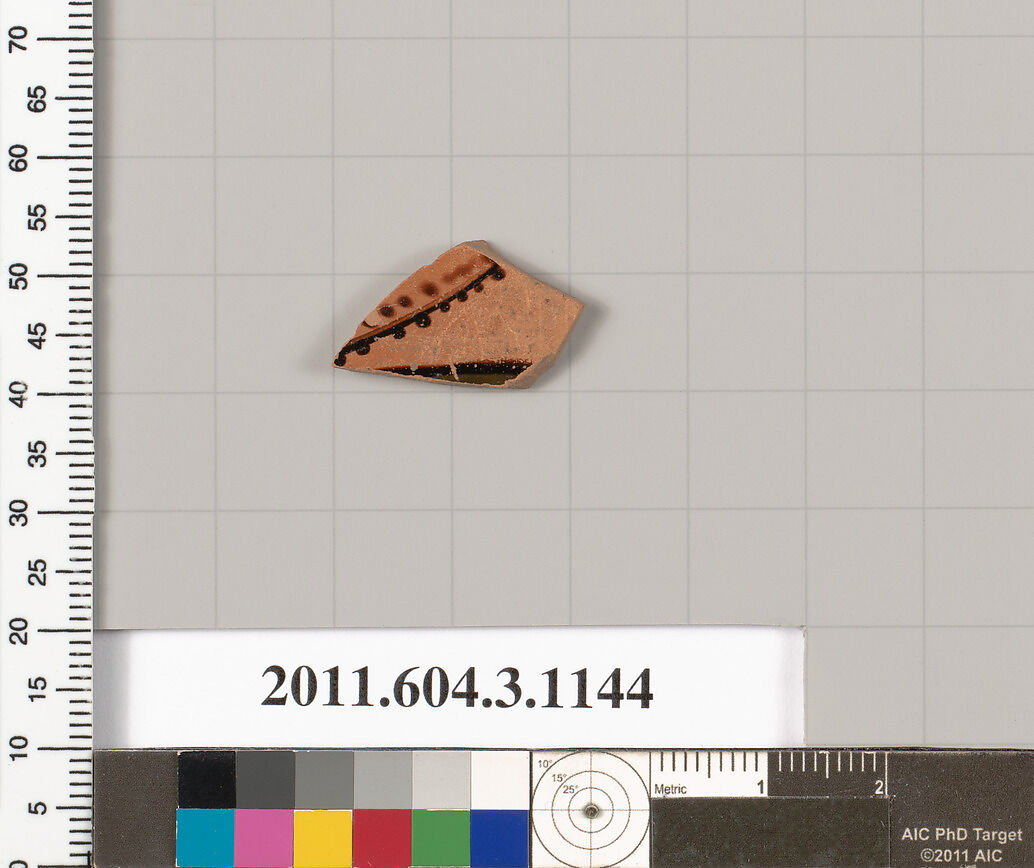 Terracotta fragment of a mastoid (drinking cup with narrow base) or a kyathos (cup-shaped ladle), Terracotta, Greek, Attic 