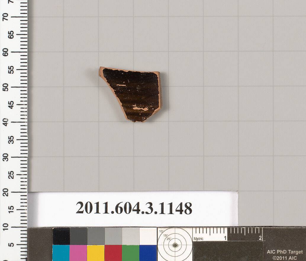 Terracotta fragment of a mastoid (drinking cup with narrow base) or a kyathos (cup-shaped ladle), Terracotta, Greek, Attic