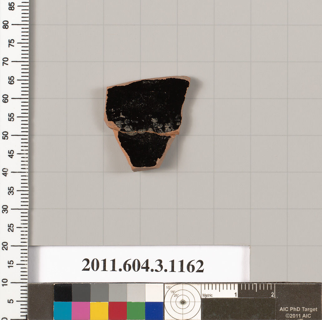 Terracotta fragment of a mastoid (drinking cup with narrow base) or a kyathos (cup-shaped ladle), Terracotta, Greek, Attic