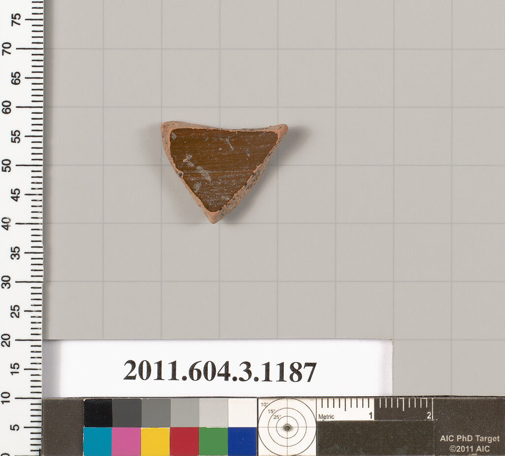 Terracotta fragment of a mastoid (drinking cup with narrow base), Terracotta, Greek, Attic
