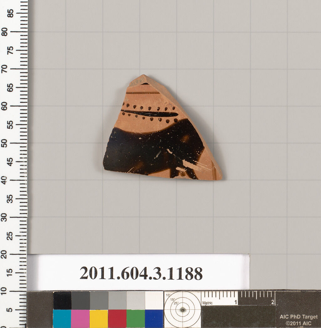 Terracotta fragment of a mastoid (drinking cup with narrow base), Terracotta, Greek, Attic 