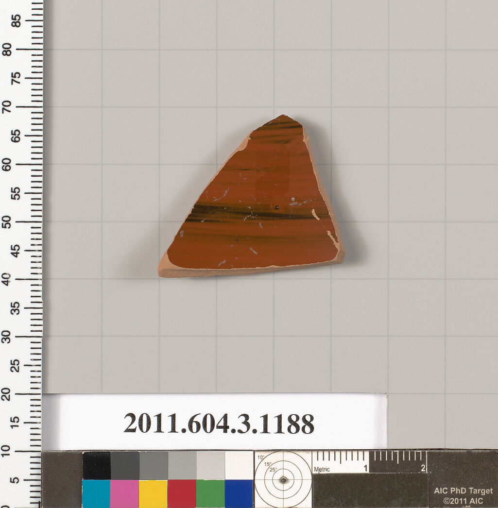 Terracotta fragment of a mastoid (drinking cup with narrow base), Terracotta, Greek, Attic
