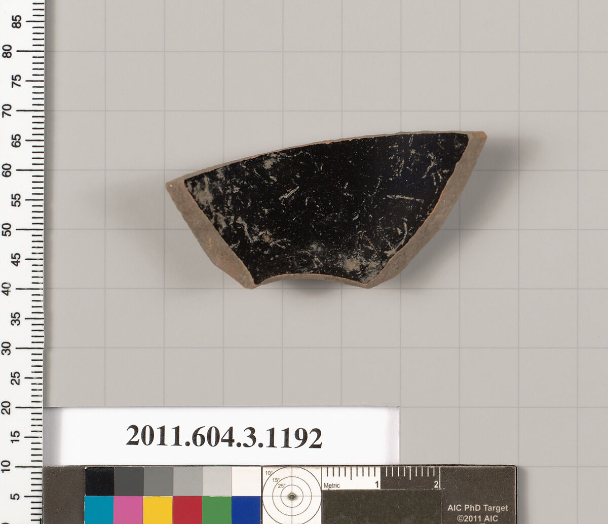 Terracotta fragment of a mastoid (drinking cup with narrow base), Terracotta, Greek, Attic