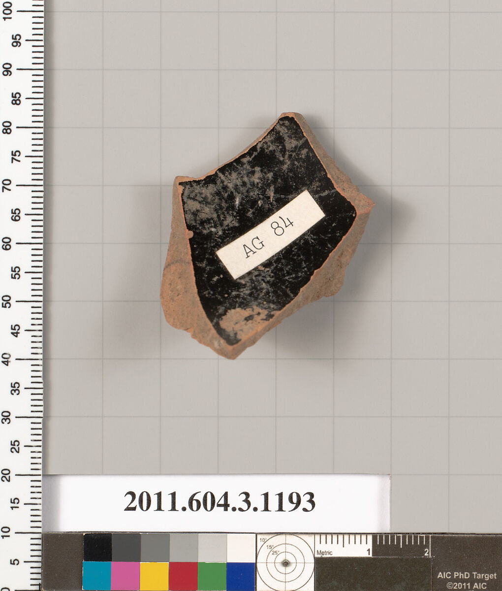 Terracotta fragment of a mastoid (drinking cup with narrow base), Terracotta, Greek, Attic