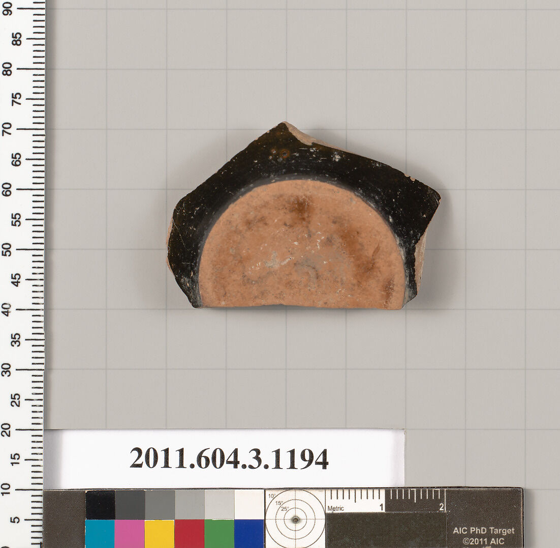Terracotta fragment of a mastoid (drinking cup with narrow base), Terracotta, Greek, Attic