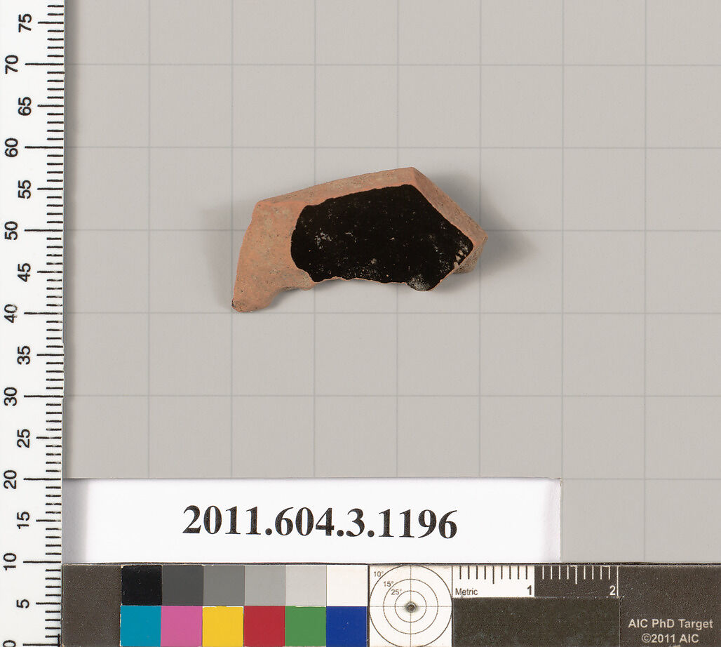 Terracotta fragment of a mastoid (drinking cup with narrow base), Terracotta, Greek, Attic