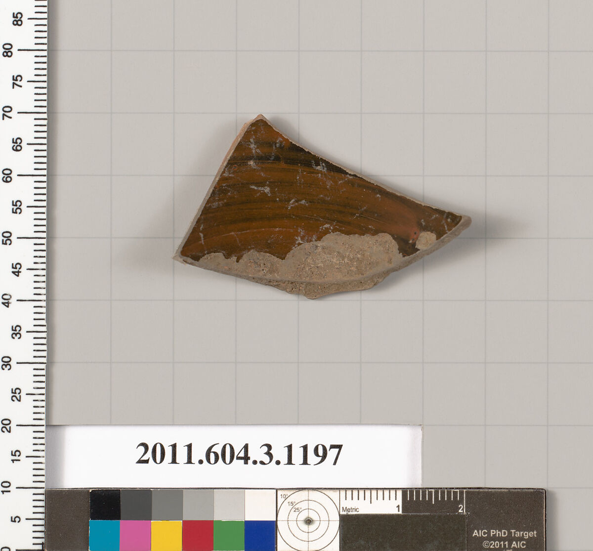 Terracotta fragment of a mastoid (drinking cup with narrow base), Terracotta, Greek, Attic